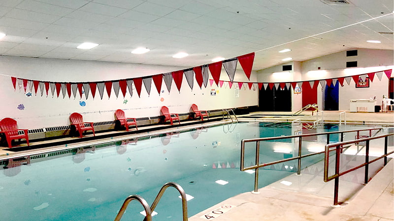 SNP-pool swim teacher with student