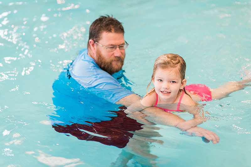 teacher-student-6 swim teach and student doing back float