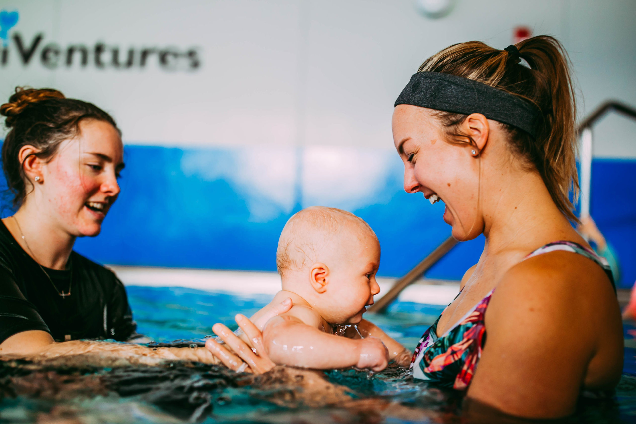 swim teach and student doing back float