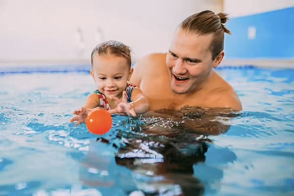 Father & Baby Swimming