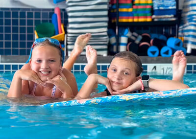 Siblings Swimming