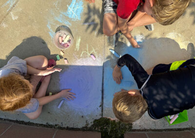 Summer Camp Kids Drawing with Chalk